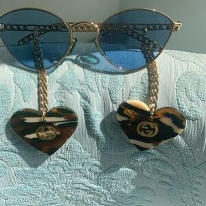 Gucci Women's Sunglasses with Tortoise Heart Accents